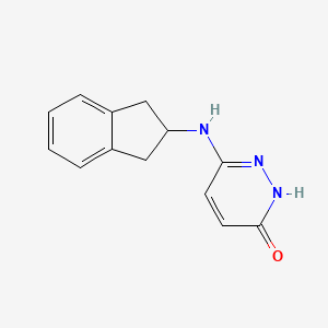 molecular formula C13H13N3O B1479390 6-((2,3-dihydro-1H-inden-2-yl)amino)pyridazin-3-ol CAS No. 2098050-04-3