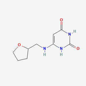 molecular formula C9H13N3O3 B1480226 6-(((四氢呋喃-2-基)甲基)氨基)嘧啶-2,4(1H,3H)-二酮 CAS No. 1933664-74-4
