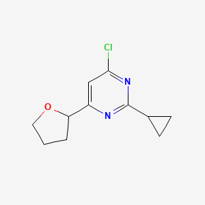 molecular formula C11H13ClN2O B1480291 4-Chloro-2-cyclopropyl-6-(tetrahydrofuran-2-yl)pyrimidine CAS No. 2098018-77-8