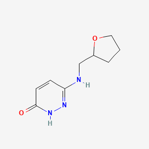 molecular formula C9H13N3O2 B1480313 6-(((Tetrahydrofuran-2-yl)methyl)amino)pyridazin-3-ol CAS No. 1933589-13-9