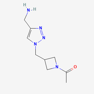 molecular formula C9H15N5O B1481287 1-(3-((4-(aminomethyl)-1H-1,2,3-triazol-1-yl)methyl)azetidin-1-yl)ethan-1-one CAS No. 2090866-30-9