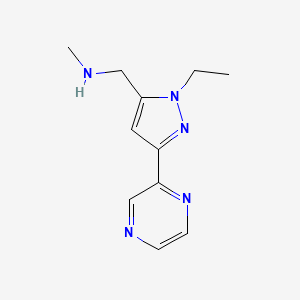 molecular formula C11H15N5 B1481697 1-(1-ethyl-3-(pyrazin-2-yl)-1H-pyrazol-5-yl)-N-methylmethanamine CAS No. 2098104-71-1