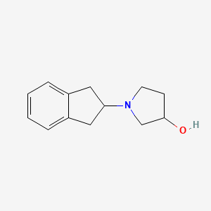 molecular formula C13H17NO B1482184 1-(2,3-dihydro-1H-inden-2-yl)pyrrolidin-3-ol CAS No. 2098133-73-2