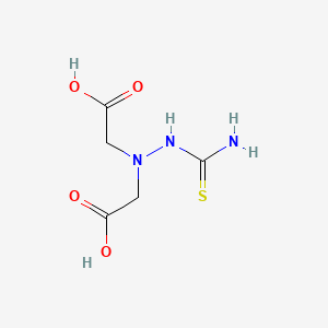 Acetic acid, 2,2'-[(aminothioxomethyl)hydrazono]bis-