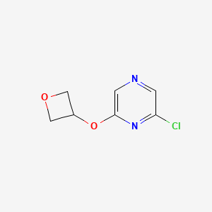 molecular formula C7H7ClN2O2 B1482307 2-Chloro-6-(oxetan-3-yloxy)pyrazine CAS No. 1602216-99-8
