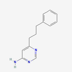molecular formula C13H15N3 B1482565 6-(3-Phenylpropyl)pyrimidin-4-amine CAS No. 2098101-59-6