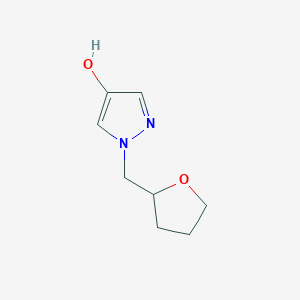 molecular formula C8H12N2O2 B1482712 1-(oxolan-2-ylmethyl)-1H-pyrazol-4-ol CAS No. 1596683-46-3