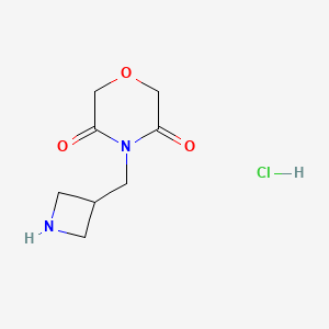 molecular formula C8H13ClN2O3 B1483064 4-(Azetidin-3-ylmethyl)morpholine-3,5-dione hydrochloride CAS No. 2098031-73-1