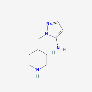 molecular formula C9H16N4 B1483556 1-(piperidin-4-ylmethyl)-1H-pyrazol-5-amine CAS No. 2098023-01-7