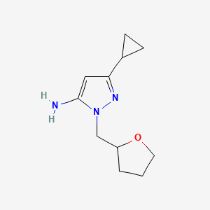 molecular formula C11H17N3O B1483864 3-环丙基-1-((四氢呋喃-2-基)甲基)-1H-吡唑-5-胺 CAS No. 2098023-26-6