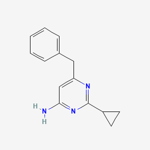 molecular formula C14H15N3 B1484155 6-Benzyl-2-cyclopropylpyrimidin-4-amine CAS No. 2097997-51-6