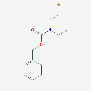 molecular formula C12H16BrNO2 B1484221 (2-Bromoethyl)ethylcarbamic acid benzyl ester CAS No. 2168031-88-5