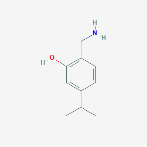 molecular formula C10H15NO B14846588 2-(Aminomethyl)-5-isopropylphenol 