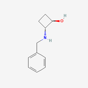 molecular formula C11H15NO B1484677 trans-2-(Benzylamino)cyclobutan-1-ol CAS No. 1844211-15-9