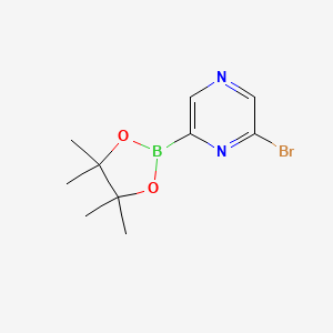 molecular formula C10H14BBrN2O2 B14849916 2-Bromo-6-(4,4,5,5-tetramethyl-1,3,2-dioxaborolan-2-yl)pyrazine 