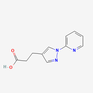 molecular formula C11H11N3O2 B1485418 3-[1-(pyridin-2-yl)-1H-pyrazol-4-yl]propanoic acid CAS No. 2098085-27-7