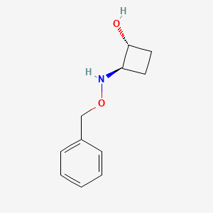 molecular formula C11H15NO2 B1485644 trans-2-[(Benzyloxy)amino]cyclobutan-1-ol CAS No. 2160330-30-1