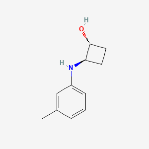 trans-2-[(3-Methylphenyl)amino]cyclobutan-1-ol