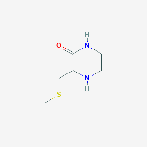 molecular formula C6H12N2OS B14861543 3-Methylsulfanylmethyl-piperazin-2-one 