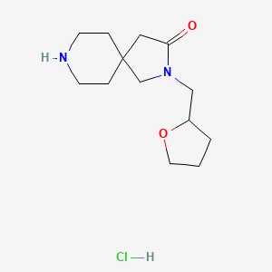 molecular formula C13H23ClN2O2 B1486158 2-(Tetrahydro-2-furanylmethyl)-2,8-diazaspiro[4.5]decan-3-one hydrochloride CAS No. 2204958-39-2