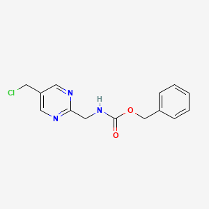 molecular formula C14H14ClN3O2 B14869186 Benzyl ((5-(chloromethyl)pyrimidin-2-yl)methyl)carbamate CAS No. 944901-32-0