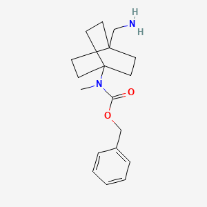 molecular formula C18H26N2O2 B1487235 Benzyl 4-(aminomethyl)bicyclo[2.2.2]octan-1-ylmethylcarbamate CAS No. 2231676-61-0