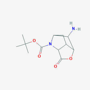 molecular formula C12H18N2O4 B1487286 tert-Butyl 9-amino-4-oxo-5-oxa-2-azatricyclo[4.2.1.0~3,7~]nonane-2-carboxylate 