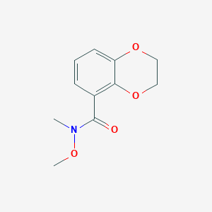 molecular formula C11H13NO4 B14875417 N-methoxy-N-methyl-2,3-dihydrobenzo[b][1,4]dioxine-5-carboxamide 