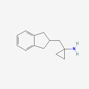 1-(2,3-Dihydro-1H-inden-2-ylmethyl)cyclopropanamine