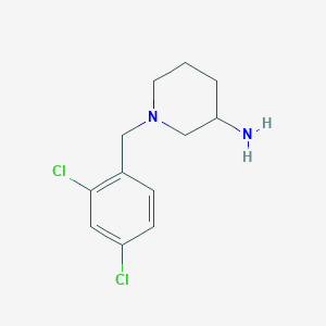 1-[(2,4-Dichlorophenyl)methyl]piperidin-3-amine