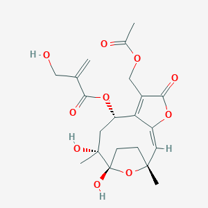 molecular formula C21H26O10 B148891 [(1R,2E,8S,10R,11S)-6-(乙酰氧甲基)-10,11-二羟基-1,10-二甲基-5-氧代-4,14-二氧杂三环[9.2.1.03,7]十四-2,6-二烯-8-基] 2-(羟甲基)丙-2-烯酸酯 CAS No. 103994-39-4