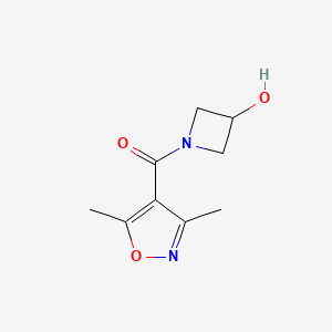 molecular formula C9H12N2O3 B1489032 (3,5-Dimethylisoxazol-4-yl)(3-hydroxyazetidin-1-yl)methanone CAS No. 1341188-73-5