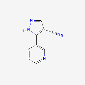 molecular formula C9H6N4 B1489269 3-(pyridin-3-yl)-1H-pyrazole-4-carbonitrile CAS No. 2098111-69-2