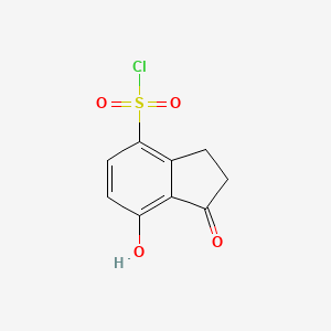 molecular formula C9H7ClO4S B14898524 7-Hydroxy-1-oxo-2,3-dihydro-1H-indene-4-sulfonyl chloride 