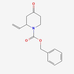 molecular formula C15H17NO3 B14910305 Benzyl 4-oxo-2-vinylpiperidine-1-carboxylate 