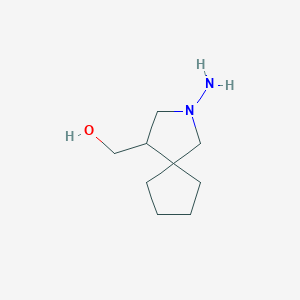 molecular formula C9H18N2O B1491066 (2-Amino-2-azaspiro[4.4]nonan-4-yl)methanol CAS No. 2098011-21-1