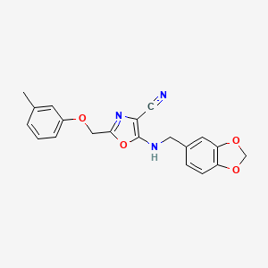 molecular formula C20H17N3O4 B14914838 5-[(Benzo[1,3]dioxol-5-ylmethyl)-amino]-2-m-tolyloxymethyl-oxazole-4-carbonitrile 