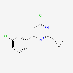 molecular formula C13H10Cl2N2 B1491716 4-Chloro-6-(3-chlorophenyl)-2-cyclopropylpyrimidine CAS No. 1412953-11-7