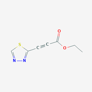 molecular formula C7H6N2O2S B1492213 3-(1,3,4-噻二唑-2-基)丙-2-炔酸乙酯 CAS No. 2097966-23-7