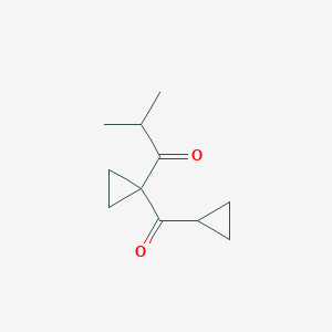 molecular formula C11H16O2 B1492295 1-(1-Cyclopropanecarbonylcyclopropyl)-2-methylpropan-1-one CAS No. 2060062-36-2