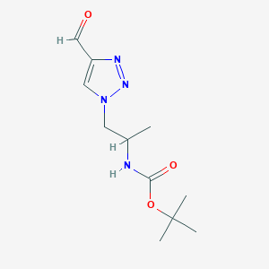 molecular formula C11H18N4O3 B1492686 tert-butyl (1-(4-formyl-1H-1,2,3-triazol-1-yl)propan-2-yl)carbamate CAS No. 2097996-89-7