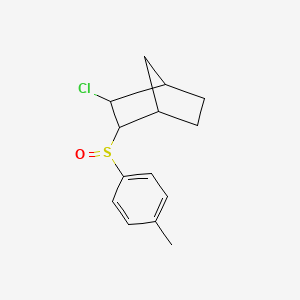 2-Chloro-3-[(4-methylphenyl)sulfinyl]bicyclo[2.2.1]heptane