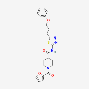 1-(furan-2-carbonyl)-N-[5-(3-phenoxypropyl)-1,3,4-thiadiazol-2-yl]piperidine-4-carboxamide