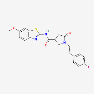 molecular formula C21H20FN3O3S B14960411 1-[2-(4-fluorophenyl)ethyl]-N-(6-methoxy-1,3-benzothiazol-2-yl)-5-oxopyrrolidine-3-carboxamide 