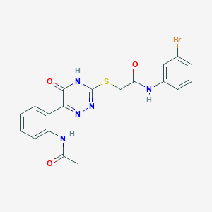 N-(3-Bromophenyl)-2-{[6-(2-acetamido-3-methylphenyl)-5-oxo-4,5-dihydro-1,2,4-triazin-3-YL]sulfanyl}acetamide