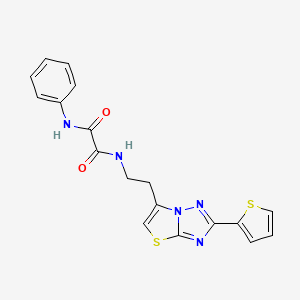 molecular formula C18H15N5O2S2 B14971885 N1-phenyl-N2-(2-(2-(thiophen-2-yl)thiazolo[3,2-b][1,2,4]triazol-6-yl)ethyl)oxalamide 