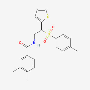 molecular formula C22H23NO3S2 B14971961 3,4-dimethyl-N-(2-(thiophen-2-yl)-2-tosylethyl)benzamide 