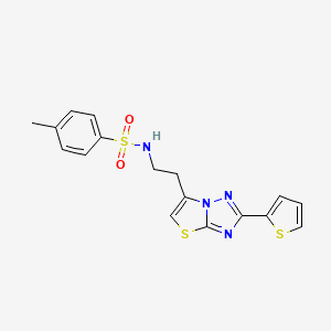 4-methyl-N-(2-(2-(thiophen-2-yl)thiazolo[3,2-b][1,2,4]triazol-6-yl)ethyl)benzenesulfonamide