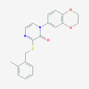 1-(2,3-Dihydro-1,4-benzodioxin-6-yl)-3-{[(2-methylphenyl)methyl]sulfanyl}-1,2-dihydropyrazin-2-one