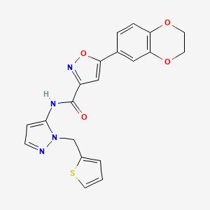 5-(2,3-dihydro-1,4-benzodioxin-6-yl)-N-[1-(thiophen-2-ylmethyl)-1H-pyrazol-5-yl]-1,2-oxazole-3-carboxamide